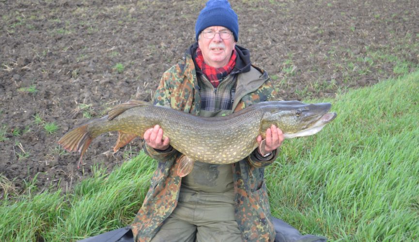 Dennis Moules holding large pike